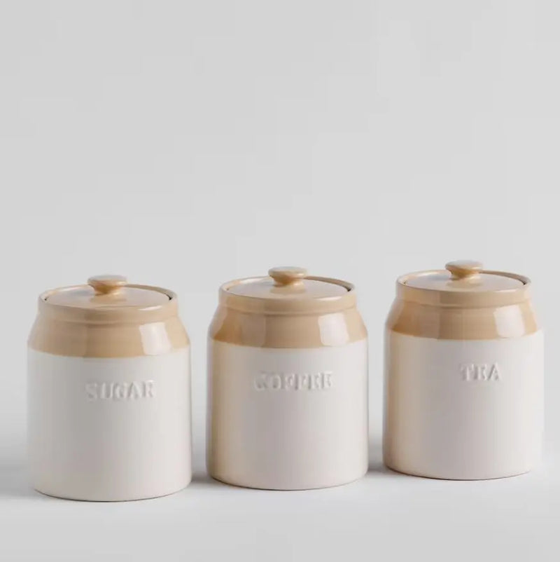 Béžová dóza s nápisom COFFEE.