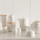 Biela dóza na maslo.