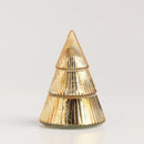 Zlatá vianočná vonná sviečka v podobe stromčeka.