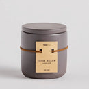 Sivá vonná sviečka.