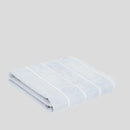 Modrý bavlnený uterák.