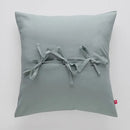 Zelená obliečka na vankúš. 