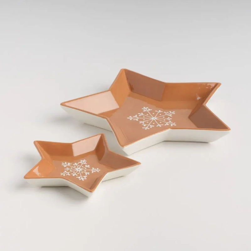 Hnedá vianočná misa z dolomitu v tvare hviezdy.