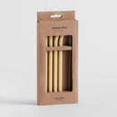 Žlté sklenené slámky.