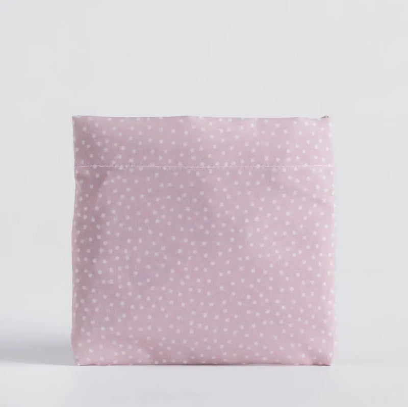 Ružová polyesterová nákupná taška.