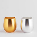 Zlatá vonná sviečka v kovovom ráme