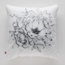 Sivá obliečka na vankúš s kvetom.