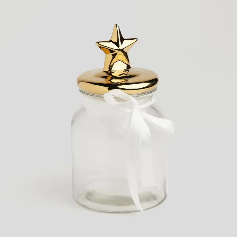 Transparentná vianočná dóza so zlatým vekom.