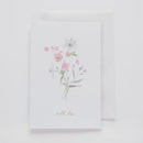 Biela pohľadnica s kvetmi a nápisom with love.