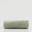 Zelený uterák vyrobený z bavlnených a bambusových tkanín