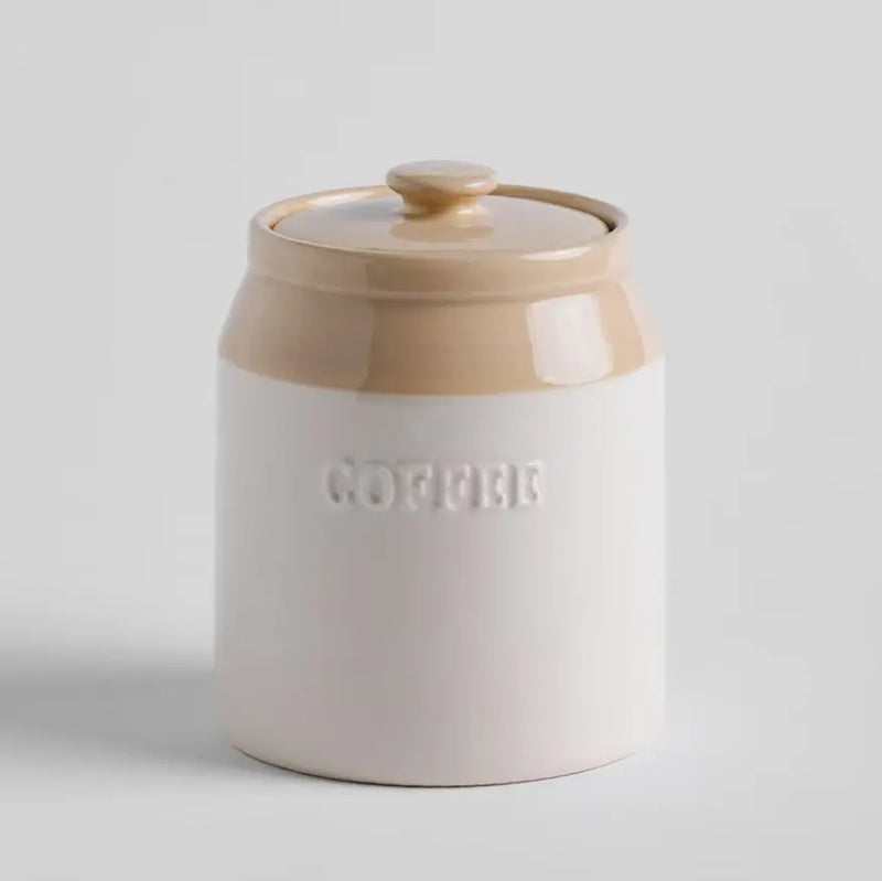 Béžová dóza s nápisom COFFEE.