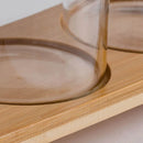 Hnedá sada štyroch dóz na podložke.