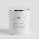 Biela vonná sviečka.