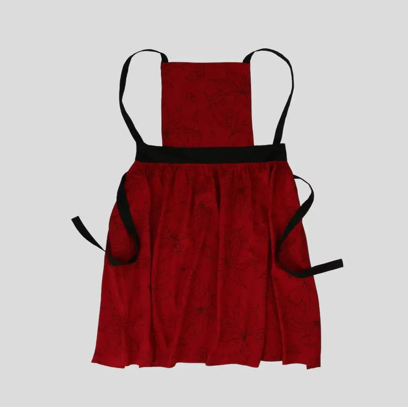 Červená vianočná zástera.