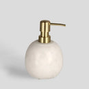 Béžový dávkovač.