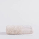 Béžový bavlnený uterák.