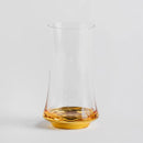 Transparentno zlatý pohár.