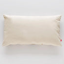 Béžová obliečka na vankúš.