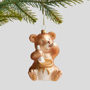 Hnedá vianočná ozdoba v podobe medvedíka s medom