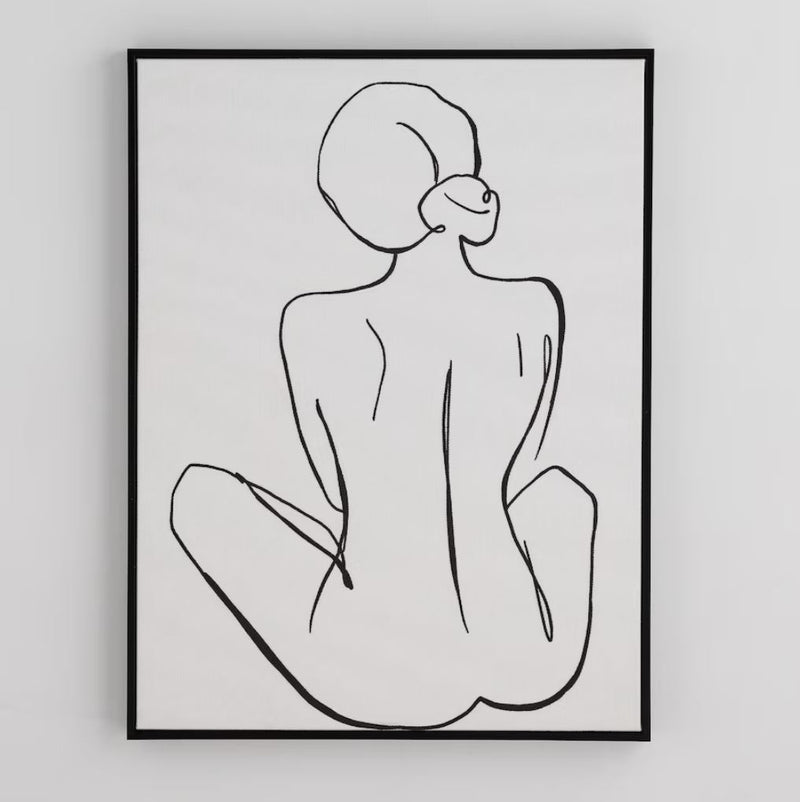 Bielo čierny obraz na plátne zobrazuje vyšívaný jemný obrys ženy. 