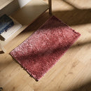 Ružová polyesterová predložka.