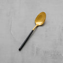 Zlato čierna lyžička z nehrdzavejúcej ocele.