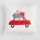 Biela vianočná obliečka na vankúš s autíčkom.
