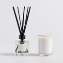 Biela vonná sviečka.