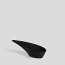 Čierna podložka na lyžičku.