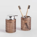 Hnedý sklenený kúpeľňový pohár.