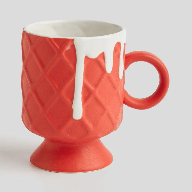 Červený vianočný hrnček.