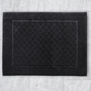 Čierna bavlnená predložka. 