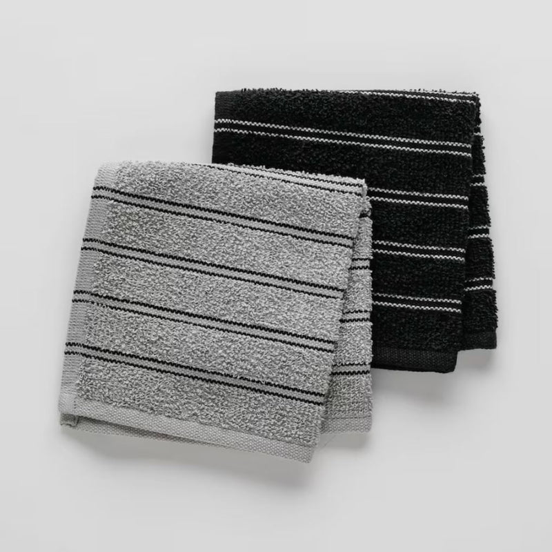 Sivé kuchynské uteráky.