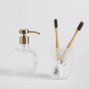 Transparentný kúpeľňový pohár. 