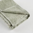 Zelený uterák vyrobený z bavlnených a bambusových tkanín