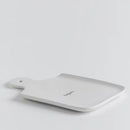 Biela doska na servírovanie. 