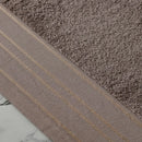 Béžový bavlnený uterák.