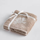 Béžová vianočná sada uterákov.