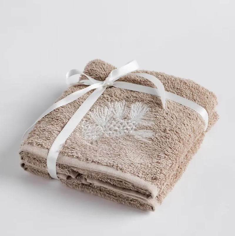 Béžová vianočná sada uterákov.