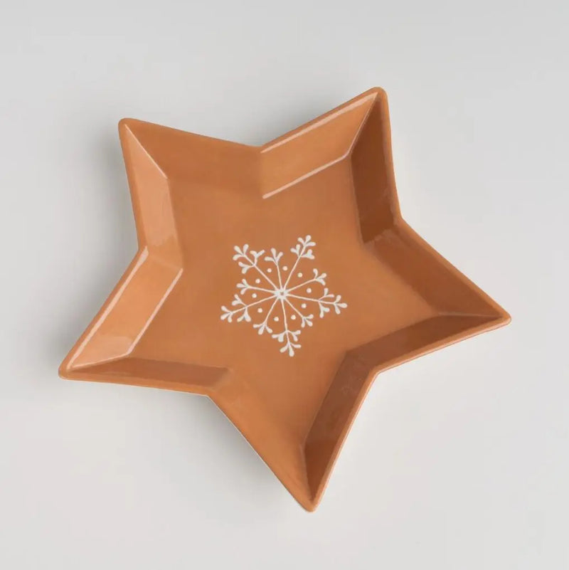 Hnedá vianočná misa z dolomitu v tvare hviezdy.