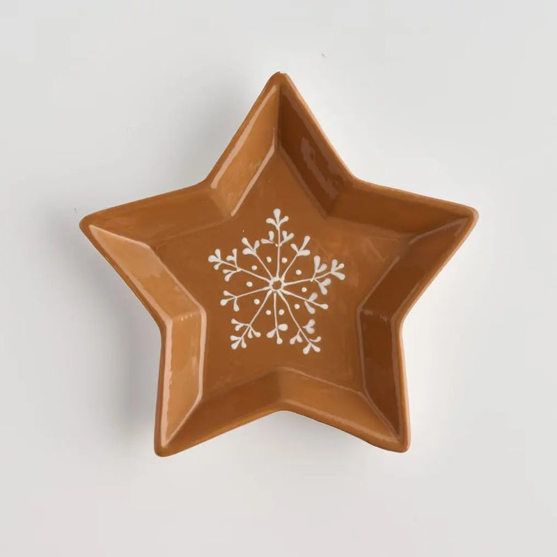 Hnedá vianočná miska z dolomitu v tvare hviezdy.