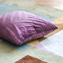 Fialová polyesterová obliečka na vankúš.