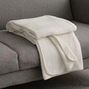 Béžová polyesterová deka